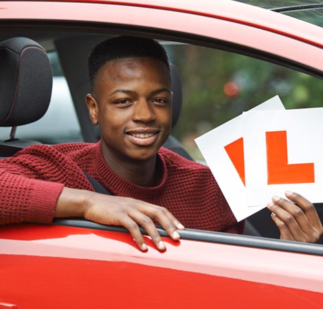 Driving instructor and learner driver during a lesson in Chichester